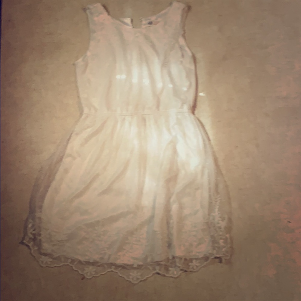 White dress with lace cover